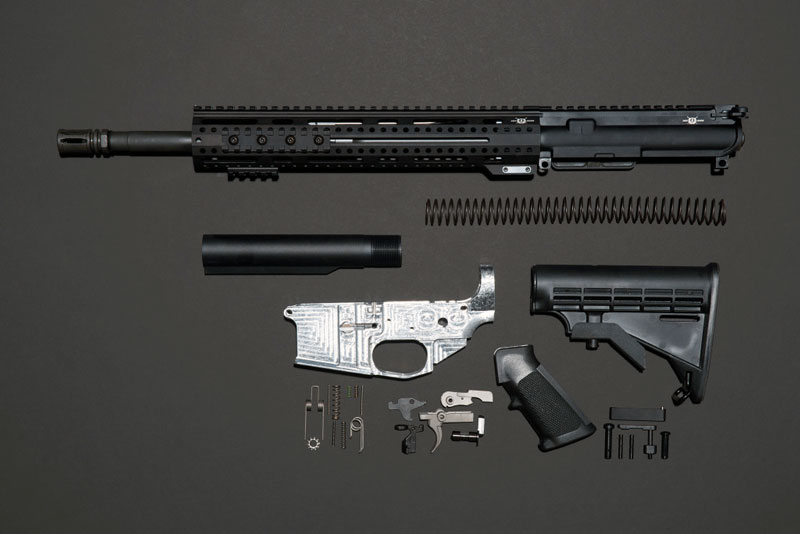 Components of the AR-15 ghost gun made by Andy Greenberg, including the homemade lower receiver. Credit: Wired.