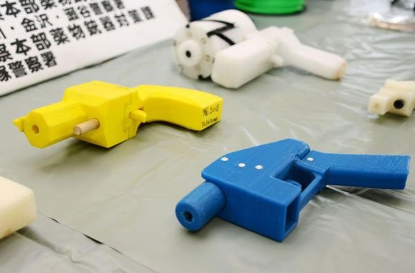Seized 3D printed plastic handguns displayed at Kanagawa police station in Yokohama, south of Tokyo, after Yoshitomo Imura's arrest in 2014.